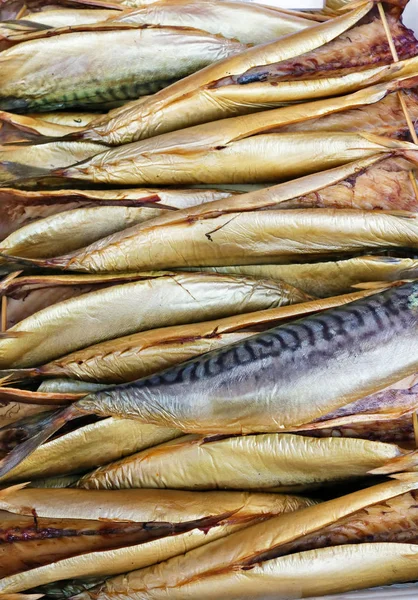 Carcass  of grilled smoked mackerel fish trout with spices and p — Stock Photo, Image
