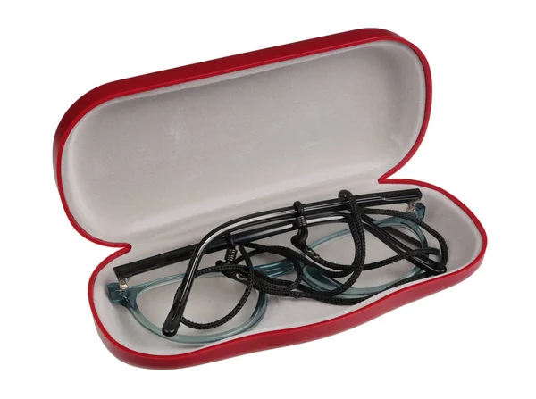 Mi abuela gafas nuevas en estuche de plástico rojo aislado macro — Foto de Stock