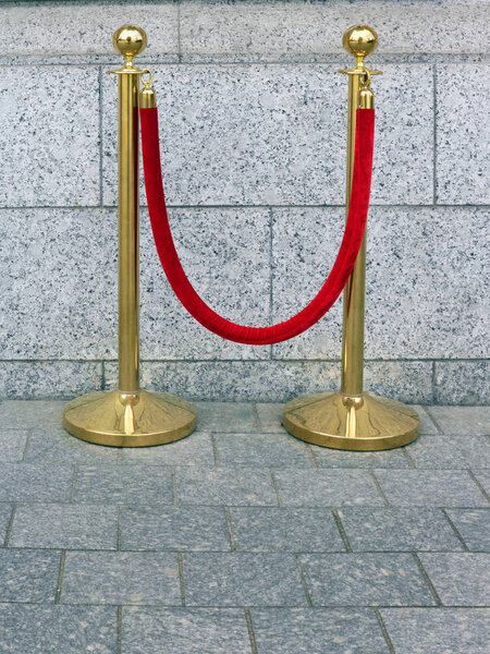 Thick velvet red rope and bronze racks for events fencing