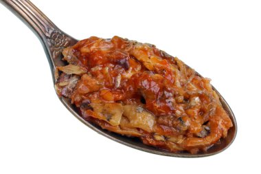 Eski altın kaşık içinde yiyecek küçük bir yığını var-balık spr