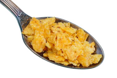 Eski altın kaşık içinde küçük bir yığın gıda-parça o