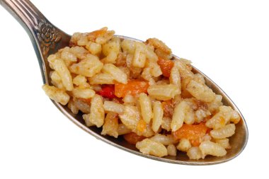 Eski altın kaşık ta küçük bir yiyecek yığını var - yağ gibi