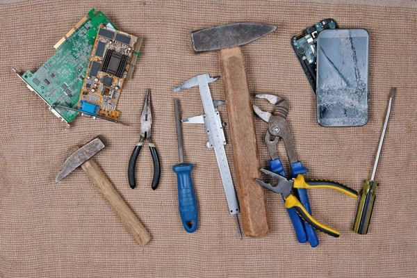 A strange set of tools for repairing old telephone and computer  equipment