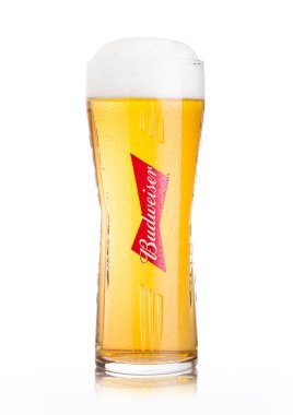 LONDON, UK - JUNE 02, 2018: Cold original glass of Budweiser Beer on white background, an American lager first introduced in 1876. clipart