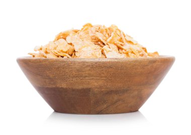 Doğal organik granola tahıl Mısır gevreği beyaz ile bambu ahşap kase.