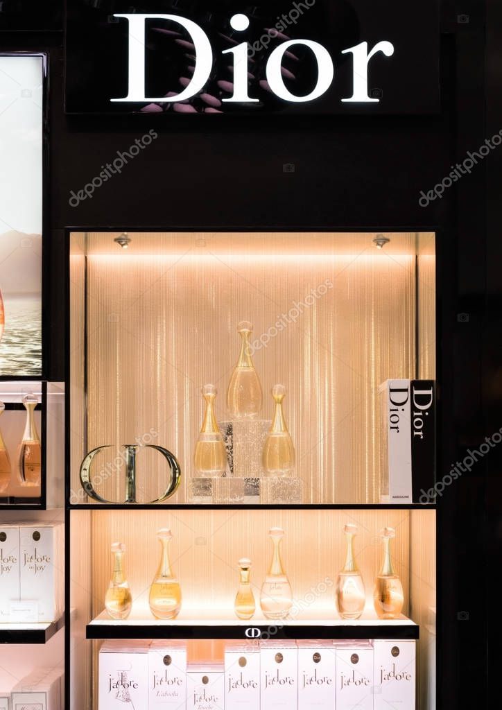 AMSTERDAM, NETHERLANDS - JULY 18, 2018: Dior frangrance perfume stand in shopping centre with logo.