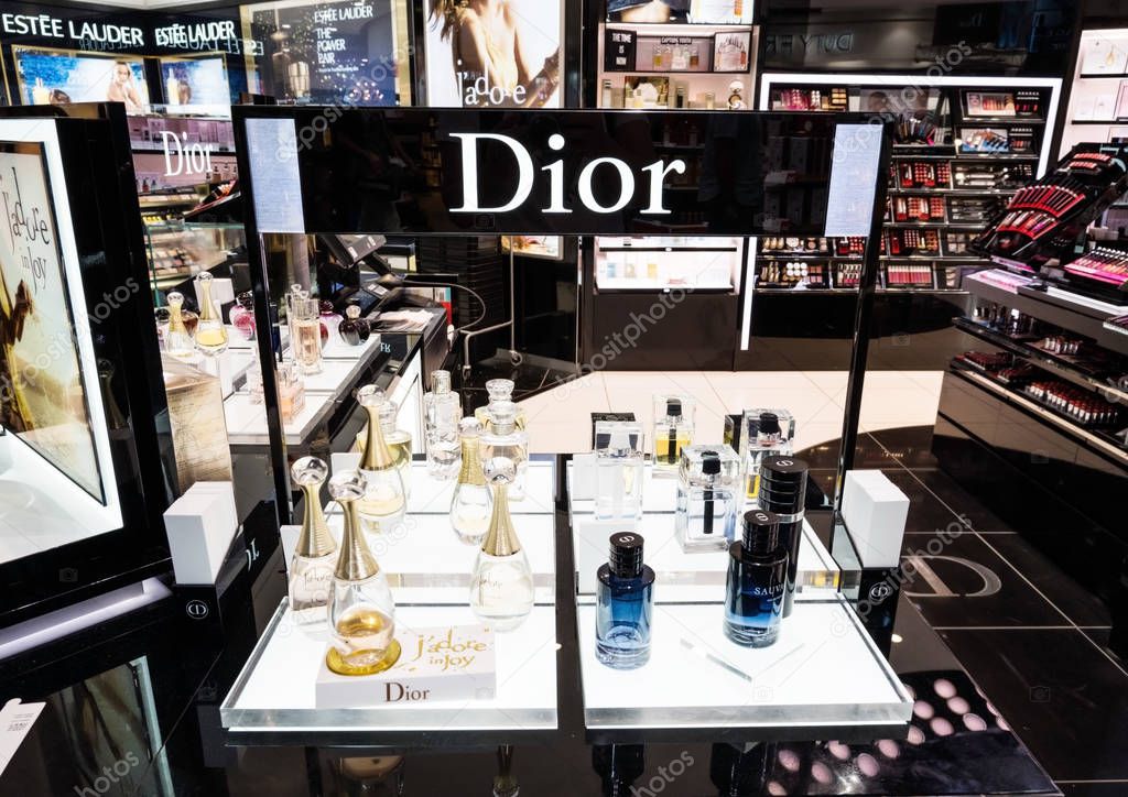 AMSTERDAM, NETHERLANDS - JULY 18, 2018: Dior frangrance perfume stand in shopping centre with logo.