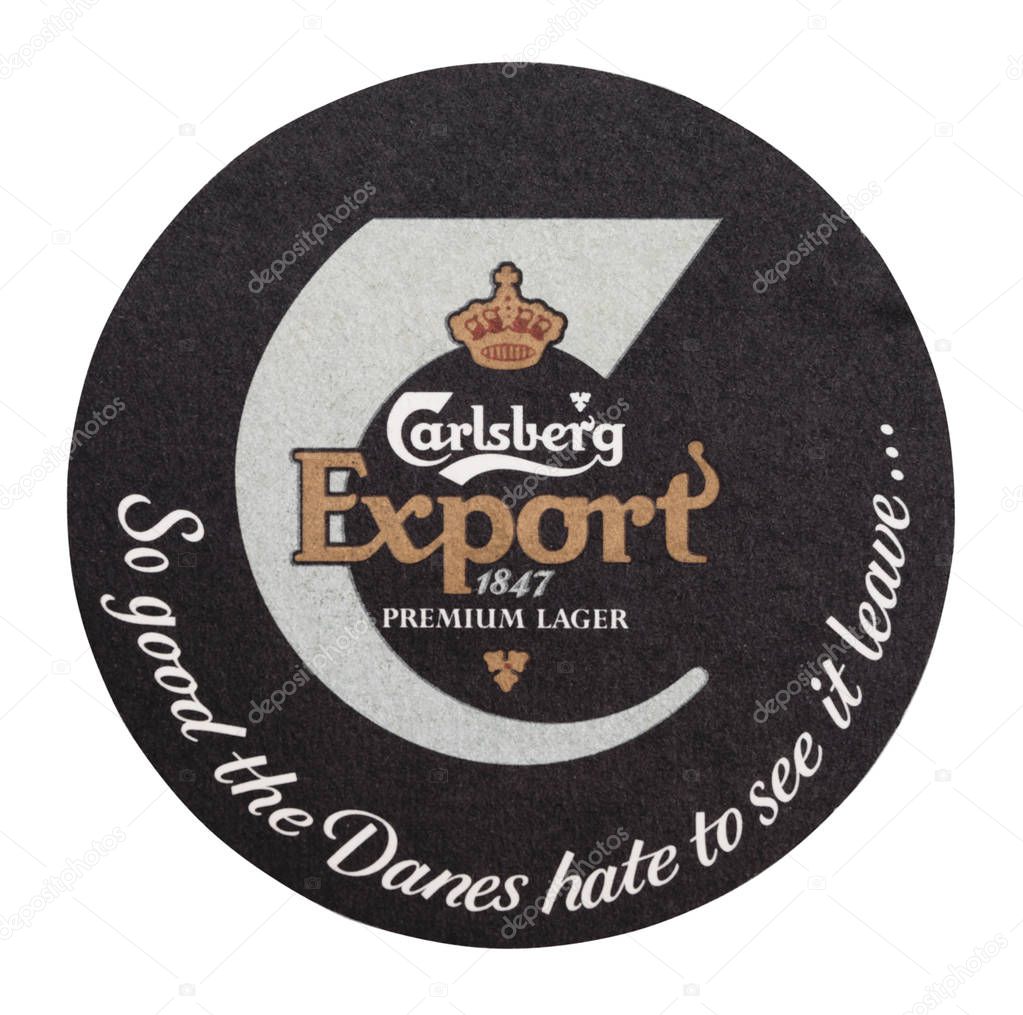 LONDON, UK - AUGUST 22, 2018: Carlsberg Export Vintage paper beer beermat coaster isolated on white background.