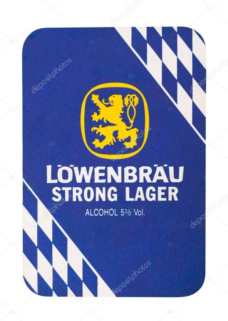 LONDON, UK - AUGUST 22, 2018: Lowenbrau Strong Lager paper beer beermat coaster isolated on white background.
