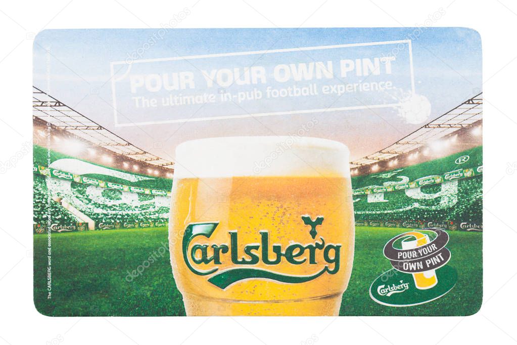 LONDON, UK - AUGUST 22, 2018: Carlsberg paper beer beermat coaster isolated on white background.