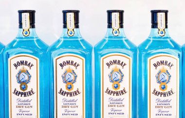LONDON, UK - AUGUST 31, 2018: Bottles of Bombay Sapphire London dry gin in liquor store. clipart