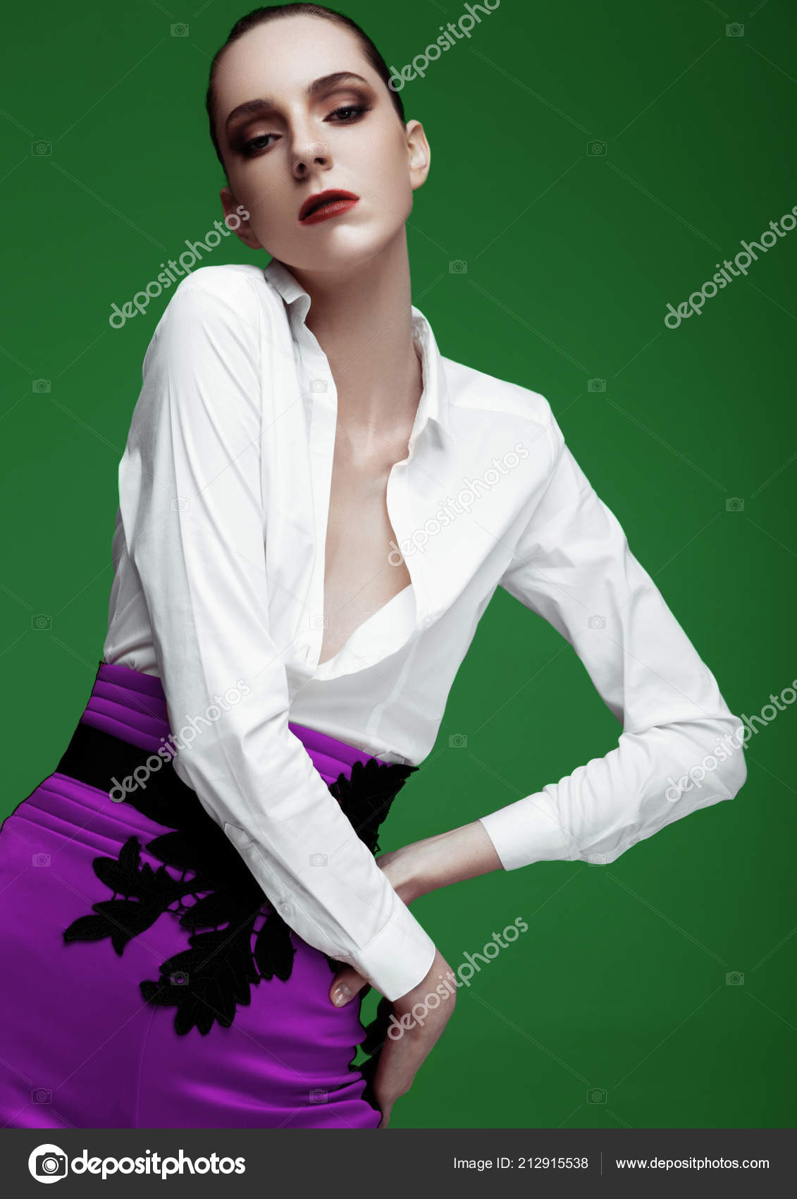 purple shirt green pants