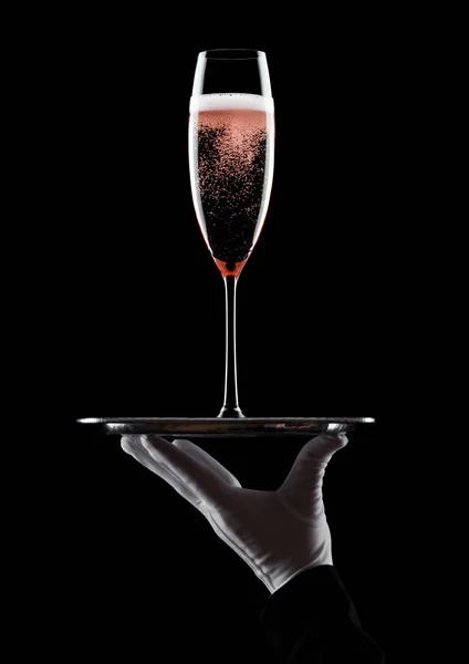 Hand Mit Handschuh Hält Tablett Mit Rosa Rosechampagne Glas Mit — Stockfoto