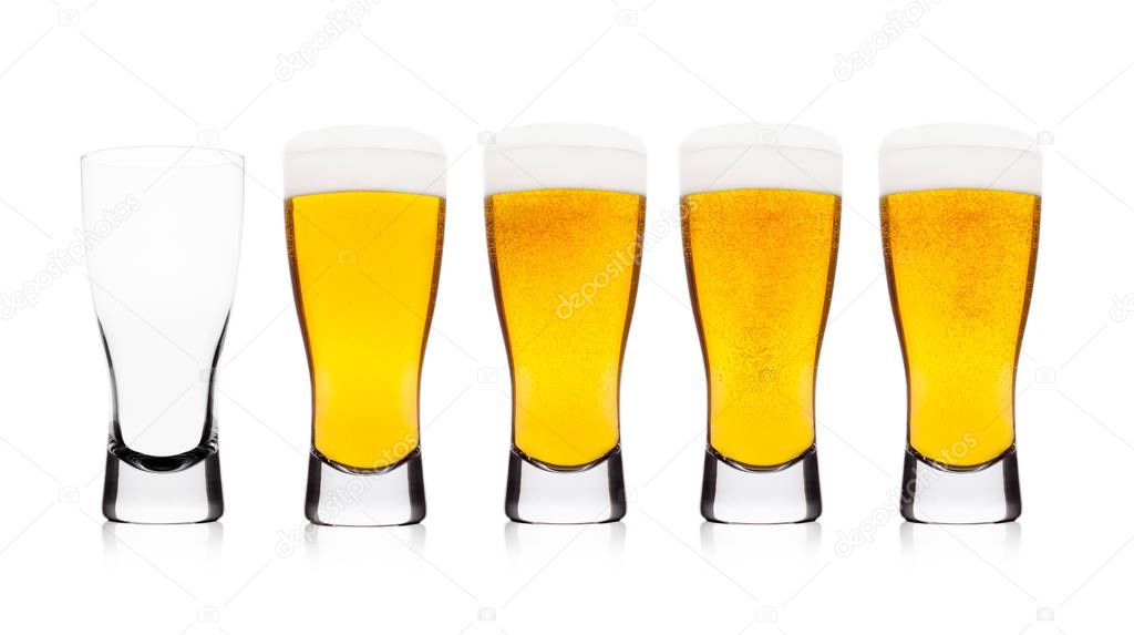 Cold elegant glasses of lager beer with isolated on white background with empty glass