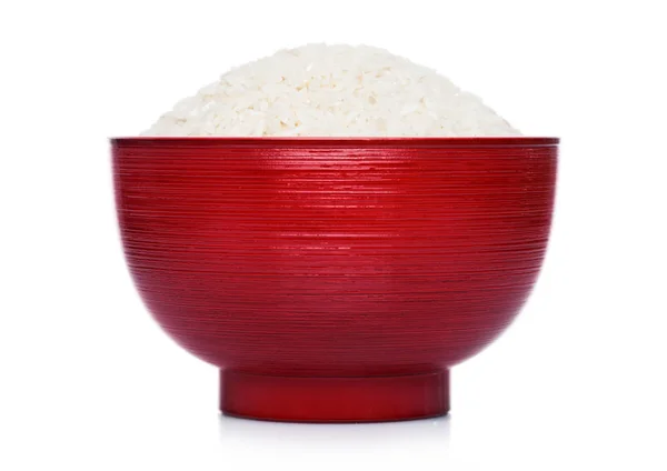 Red bowl of raw organic basmati rice on white background.Healthy food — Stock Photo, Image