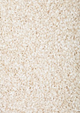 Taze çiğ organik arborio risotto pirinç Sağlıklı gıda. Makro doku