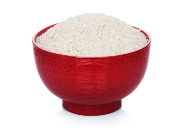 Red bowl of raw organic basmati rice on white background.Healthy food — Stock Photo, Image