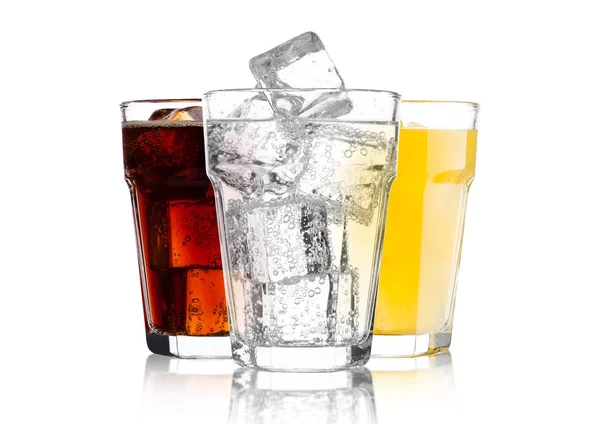 Glasses of cola and orange soda drink and lemonade — Stock Photo, Image