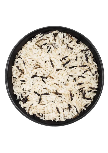 Black bowl of raw organic basmati long grain and wild rice on white background. Healthy food. — Stock Photo, Image