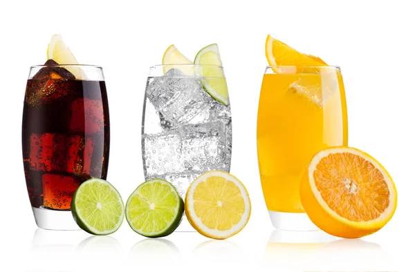 Glasses of cola and orange soda drink and lemonade — Stock Photo, Image