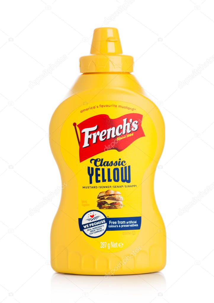 LONDON, UK - AUGUST 18, 2019: A plastic bottle container of French's classic yellow mustard on white background.