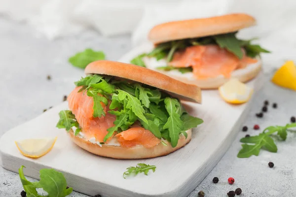 Organic Healthy Sandwiches Salmon Bagel Cream Cheese Wild Rocket Lemon — Stock Photo, Image