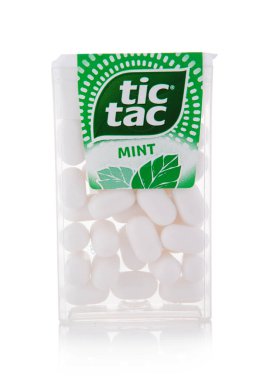 LONDON,UK - SEPTEMBER 20,2025: Tic Tac Fresh original mint drage candies in original plastic container on white.