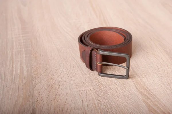 Leather Belt Wooden Desk Table — Stock Photo, Image