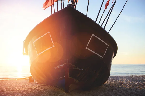 Fisherman boats at sunrise time on the beach — Stock Photo, Image