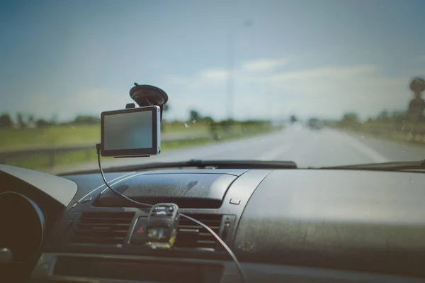 Car and blue sky with blurred clouds — Stock Photo, Image