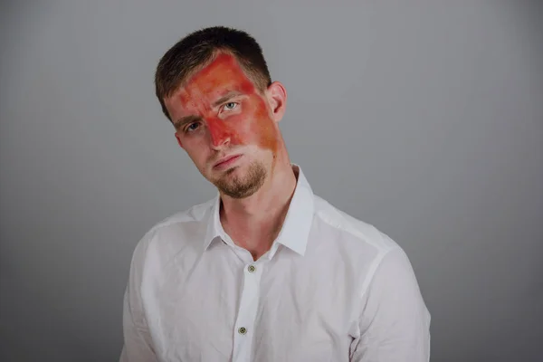 Sad worried indifferent man with a sunburned face — Stock Photo, Image