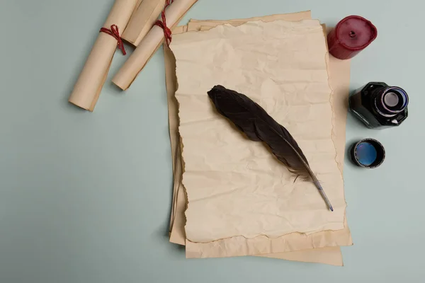 Raven Feather Inkwell Old Yellowed Paper Red Background Copy Space — Stock Photo, Image