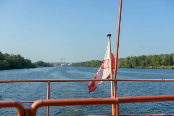 Flag of Poland at the sail ship. Odra river.