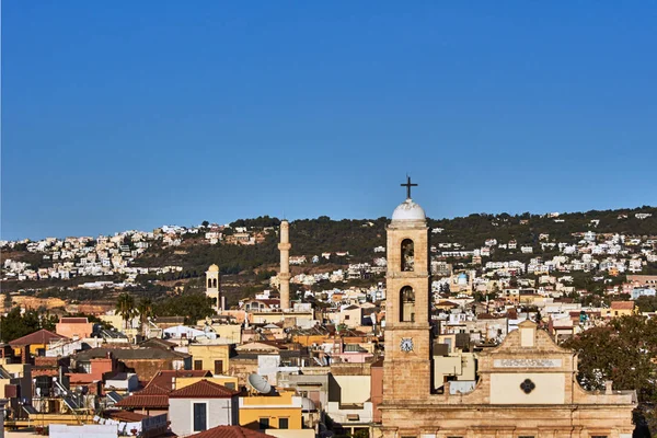 Church towers and minaret in Chania, on the island of Crete