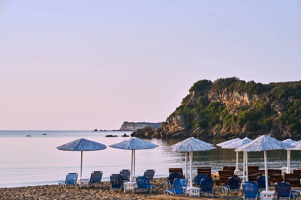 Umbrellas Sunbeds Sandy Beach Rocky Peninsula Zakynthos Island Greece — Stock Photo, Image