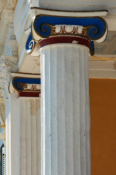 Heads Ionic columns in Achilleon Palace in Corfu island