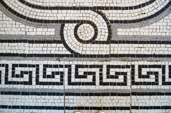 monochrome mosaic floor of building with ornaments
