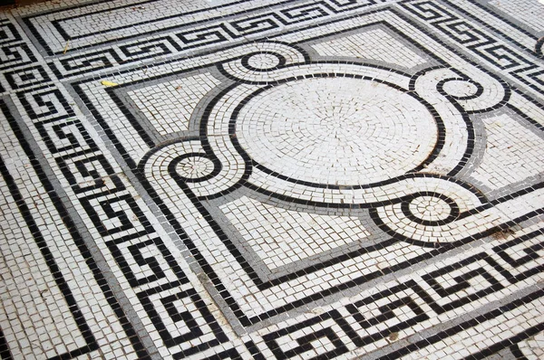 monochrome mosaic floor of building with ornaments