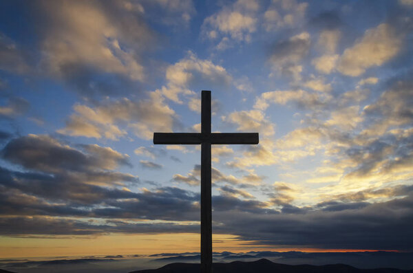 Cross and beautiful sky. Simbol of christianity
