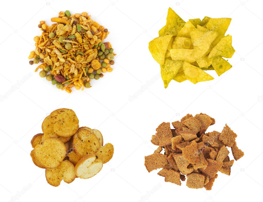 Set of snacks isolated on white. Masala, tortillas, bread rusks, croutons