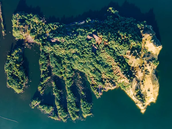 Real treasure island. Small island from above. Aeria photo