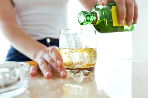 Close Young Woman Filling Glass Whiskey — Stock Photo, Image