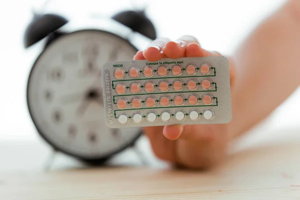 Close Contraceptive Pills Hand Witch Clock White Background Prevention Concept — Stock Photo, Image