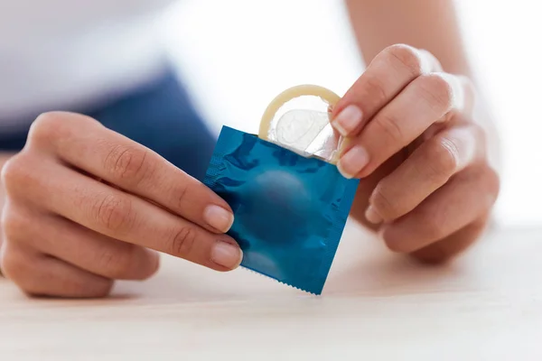 Close Young Woman Holding Condom Ready Use Safe Sex White — Stock Photo, Image