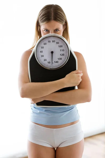 Portrait Frustrated Young Woman Looking Camera Weigh Scale White Background — Stock Photo, Image