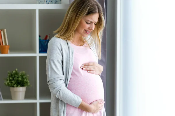Shot Pregnant Young Woman Feels Pain Stomachache Touching Her Belly — Stock Photo, Image