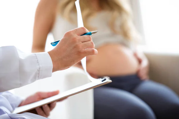 Close Hand Young Doctor Giving Routine Check Beautiful Pregnant Woman — Stock Photo, Image