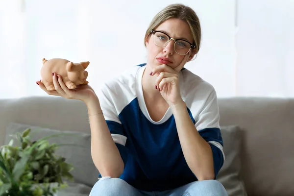 Shot Sad Young Woman Looking Camera While Holding Her Piggy — Stock Photo, Image