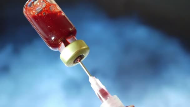 Syringe and blood vial — Stock Video