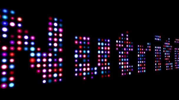 Nutrition colorful led text over black — Stock Video